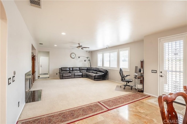 living room featuring ceiling fan