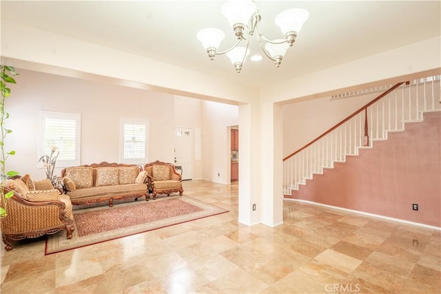 living room with an inviting chandelier