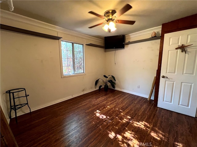 unfurnished bedroom with crown molding, ceiling fan, and dark hardwood / wood-style floors