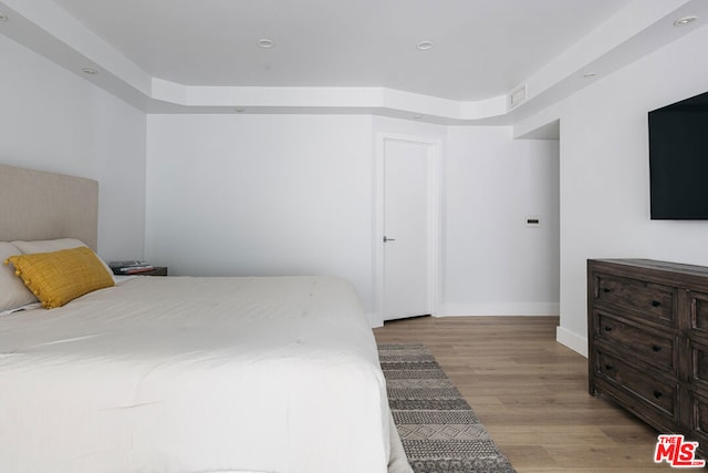 bedroom featuring light hardwood / wood-style flooring