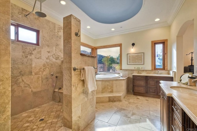 bathroom with shower with separate bathtub, vanity, and ornamental molding