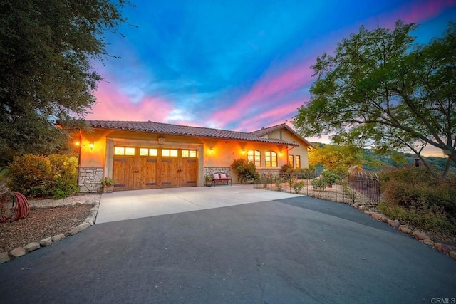 view of front of property featuring a garage