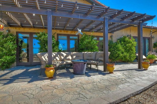 view of patio with french doors, an outdoor hangout area, and a pergola