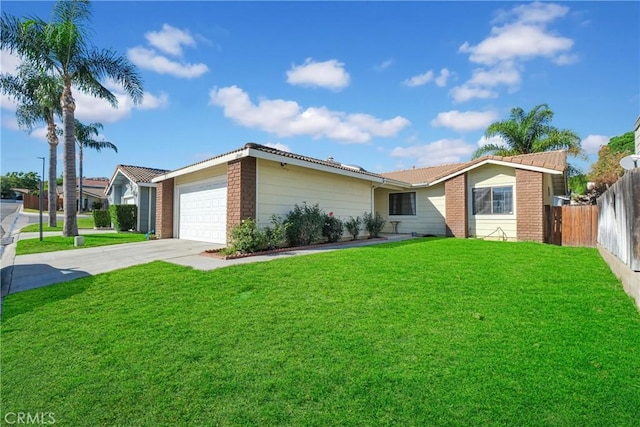 single story home with a front yard and a garage