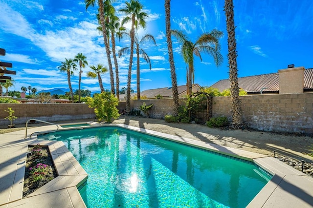 view of pool with a mountain view