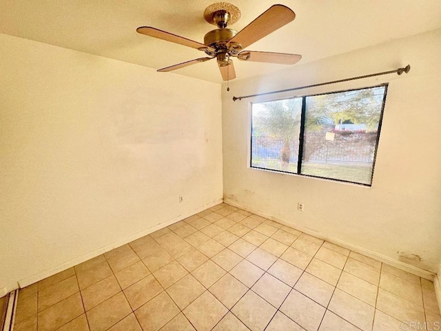 spare room featuring ceiling fan