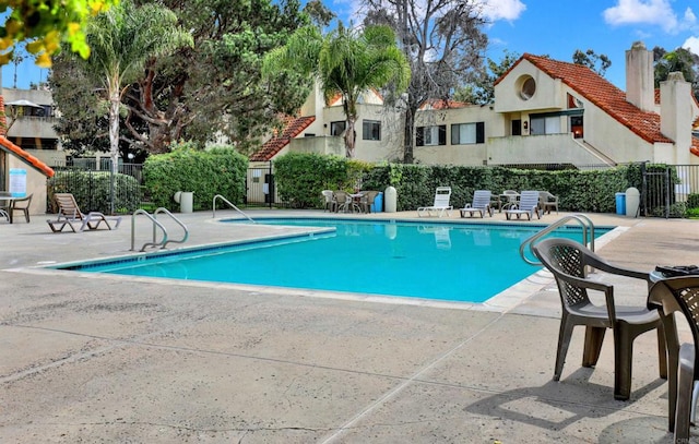 view of pool with a patio area