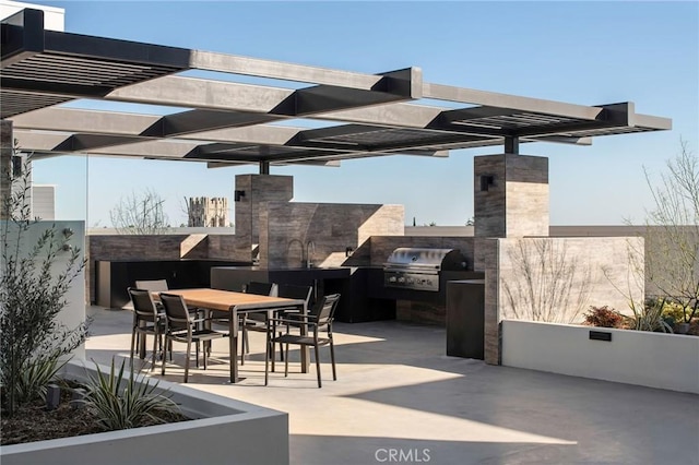 380 Cordova St Unit 403, Pasadena, CA 91101 - view of patio with outdoor dining space and a sink