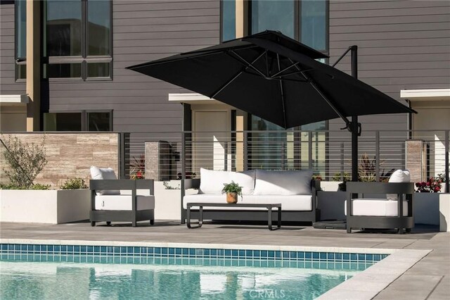 380 Cordova St Unit 403, Pasadena, CA 91101 - view of swimming pool featuring an outdoor living space and a patio area