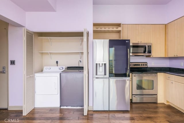 kitchen featuring washer and dryer, dark wood-type flooring, light brown cabinetry, and stainless steel appliances