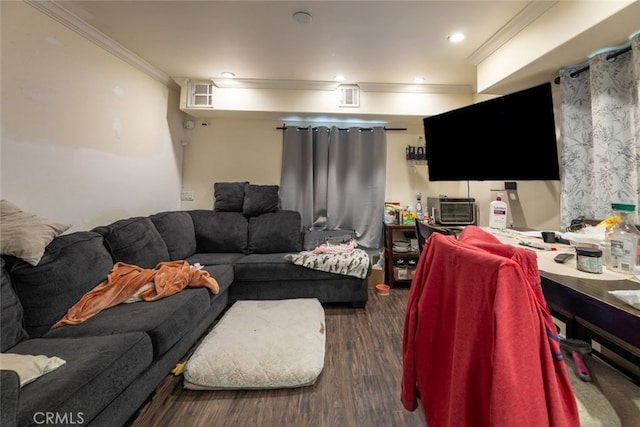 living room with ornamental molding and dark wood-type flooring