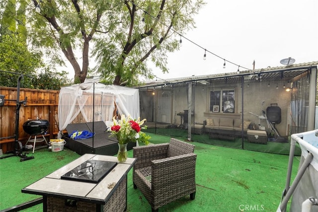 view of yard featuring a fire pit