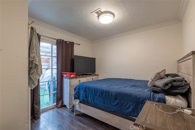 bedroom with dark hardwood / wood-style flooring, ornamental molding, and multiple windows