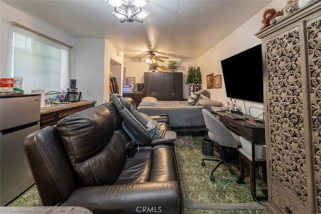 interior space with ceiling fan and sink