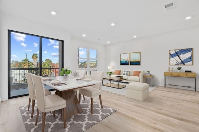 dining area featuring light hardwood / wood-style flooring