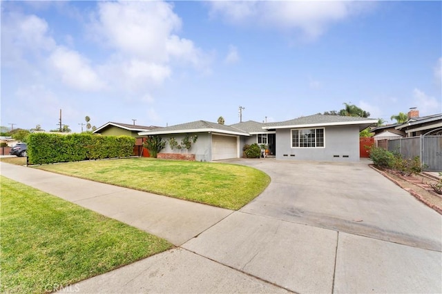 ranch-style home with a front yard and a garage