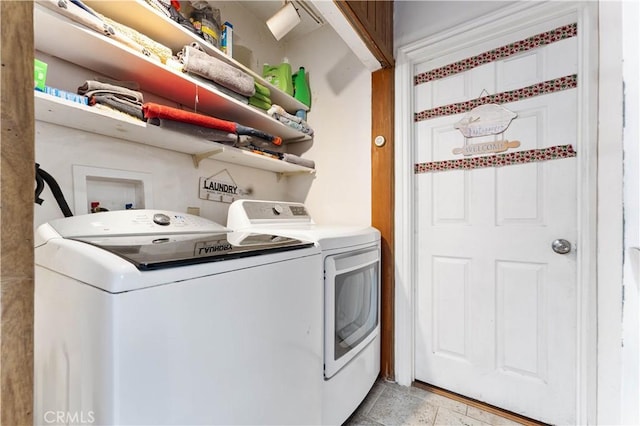 washroom featuring washer and dryer