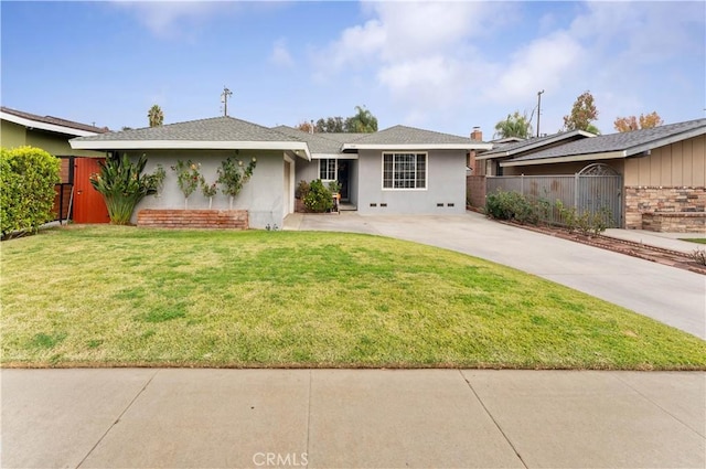 single story home with a front lawn