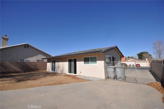 rear view of house featuring a patio area