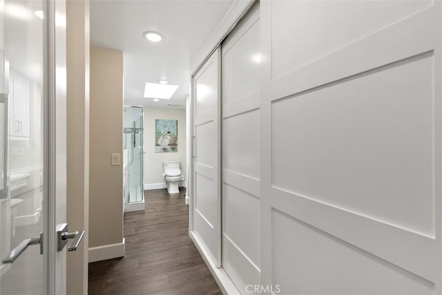 hall featuring dark hardwood / wood-style flooring