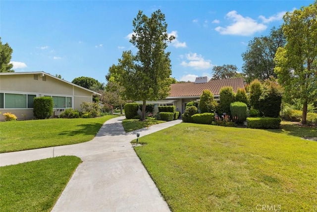 view of front of home with a front yard