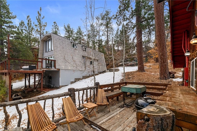 view of snow covered deck