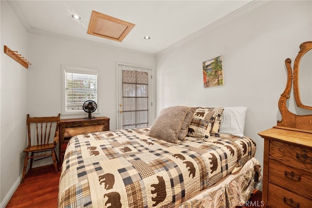 bedroom with dark hardwood / wood-style flooring and crown molding