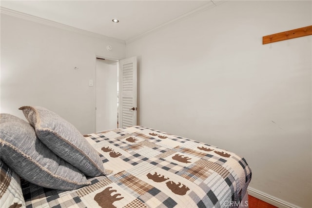 bedroom featuring ornamental molding