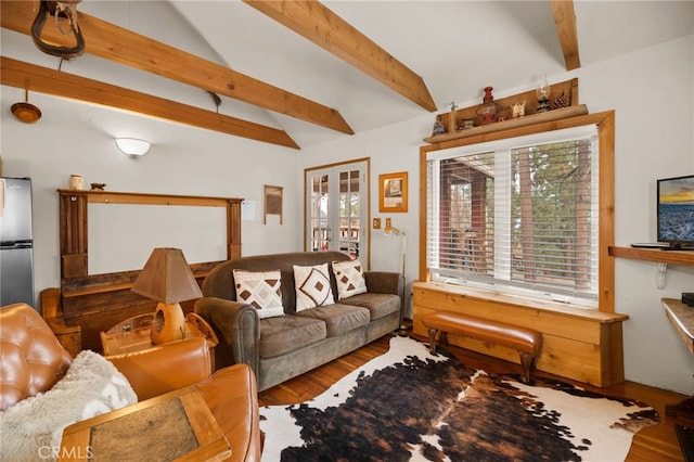 living room with vaulted ceiling with beams, wood-type flooring, and french doors