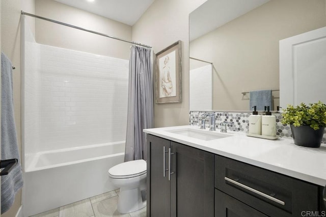 full bathroom with tasteful backsplash, tile patterned flooring, toilet, vanity, and shower / tub combo