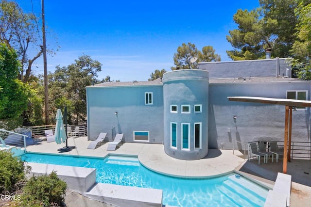 rear view of house with a patio area