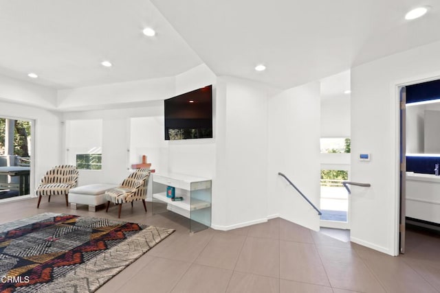 living room with tile patterned floors