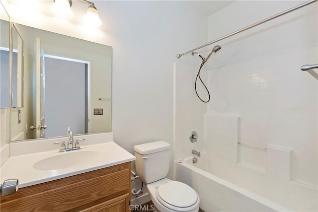 full bathroom featuring shower / tub combination, vanity, and toilet