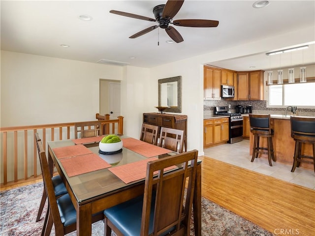 dining space featuring light hardwood / wood-style flooring