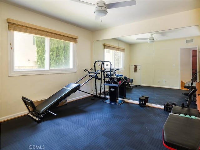 exercise room featuring ceiling fan