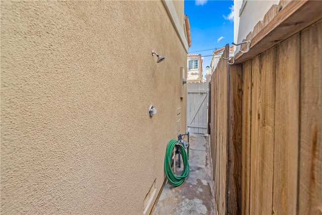 view of property exterior with stucco siding