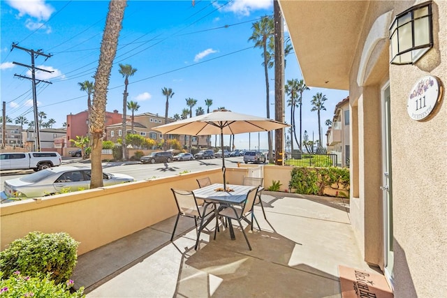 view of patio / terrace featuring fence