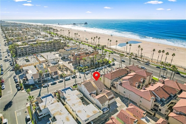 aerial view with a beach view and a water view