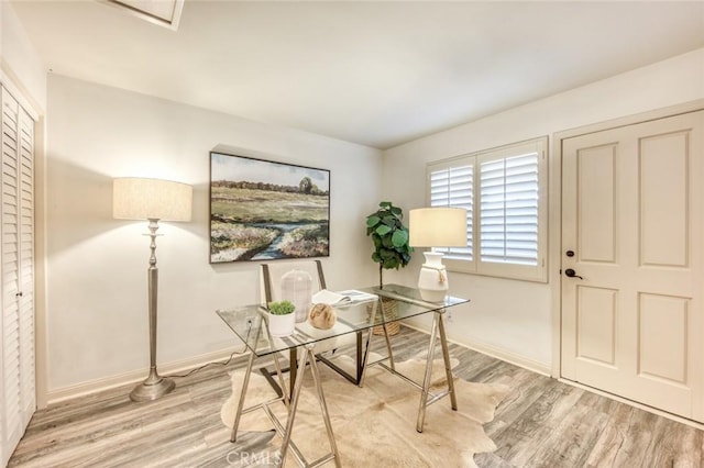 office space with light hardwood / wood-style floors