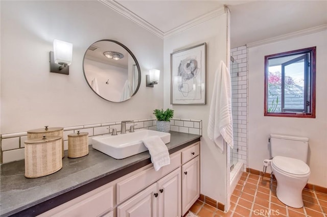 bathroom featuring a shower, crown molding, vanity, and toilet