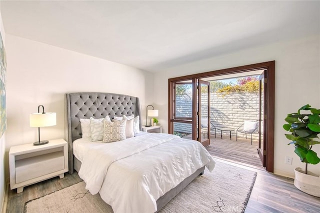 bedroom featuring hardwood / wood-style floors