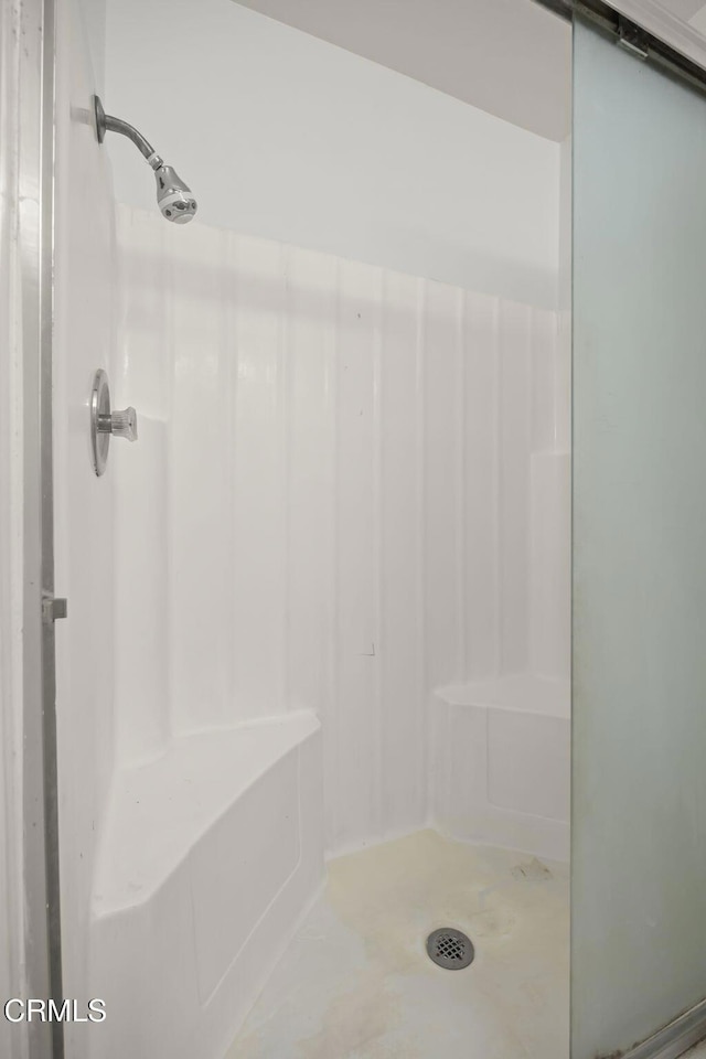 bathroom featuring walk in shower