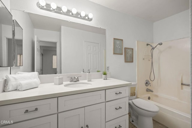 full bathroom with toilet, vanity, and bathtub / shower combination