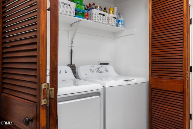 laundry area featuring washing machine and dryer