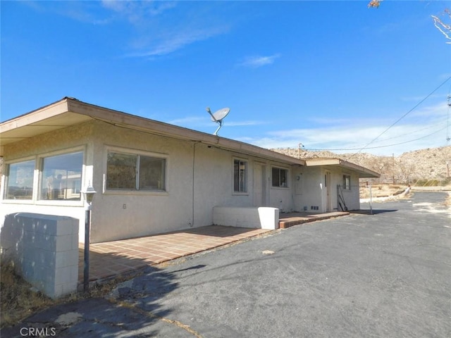 view of home's exterior with a patio area