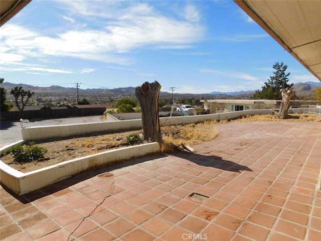 view of patio featuring a mountain view