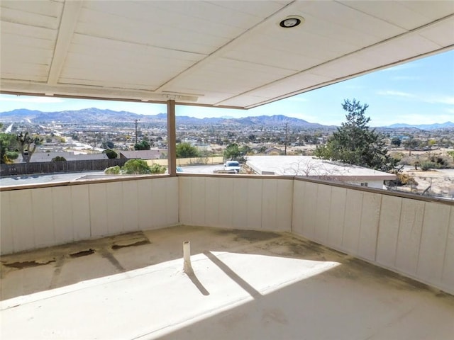 view of patio / terrace with a mountain view