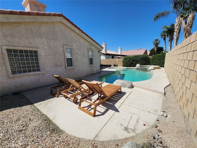 79534 Dandelion Dr, La Quinta, CA 92253 - view of pool with a fenced backyard, a patio, and a pool with connected hot tub