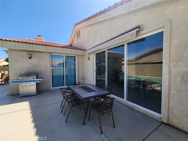 79534 Dandelion Dr, La Quinta, CA 92253 - view of patio / terrace with outdoor dining space and a grill