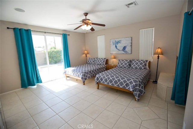 bedroom featuring access to outside, ceiling fan, and light tile patterned flooring